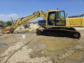 Багер Komatsu Pc240lc