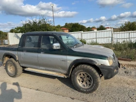 Mitsubishi L200, снимка 1