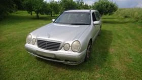       ,   Mercedes-Benz E 320