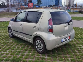 Daihatsu Sirion  1.3i-87kc-4X4-АВТОМАТИК-КЛИМАТИК-ЕВРО4, снимка 6