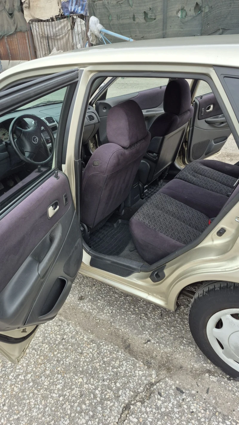 Mazda 323, снимка 7 - Автомобили и джипове - 52645168