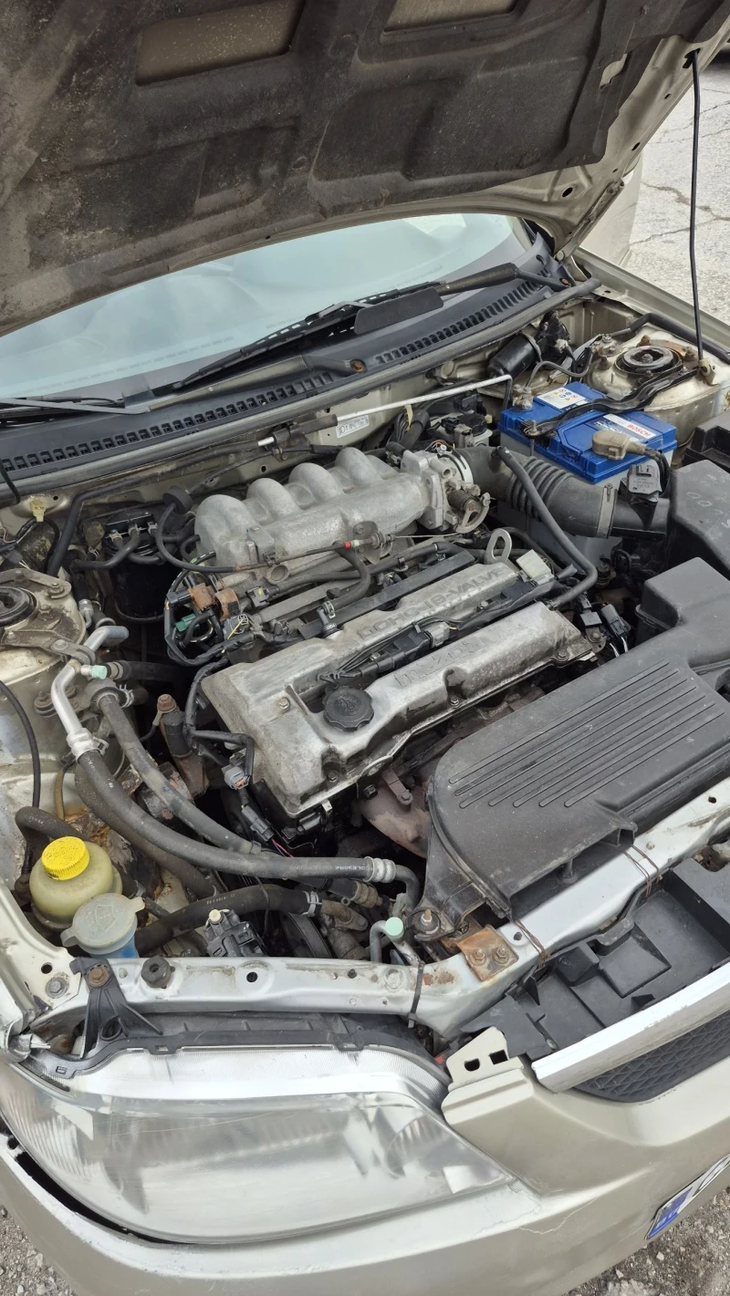 Mazda 323, снимка 13 - Автомобили и джипове - 52645168