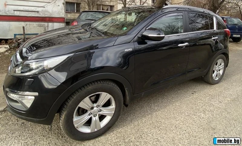 Kia Sportage, снимка 7 - Автомобили и джипове - 47586731