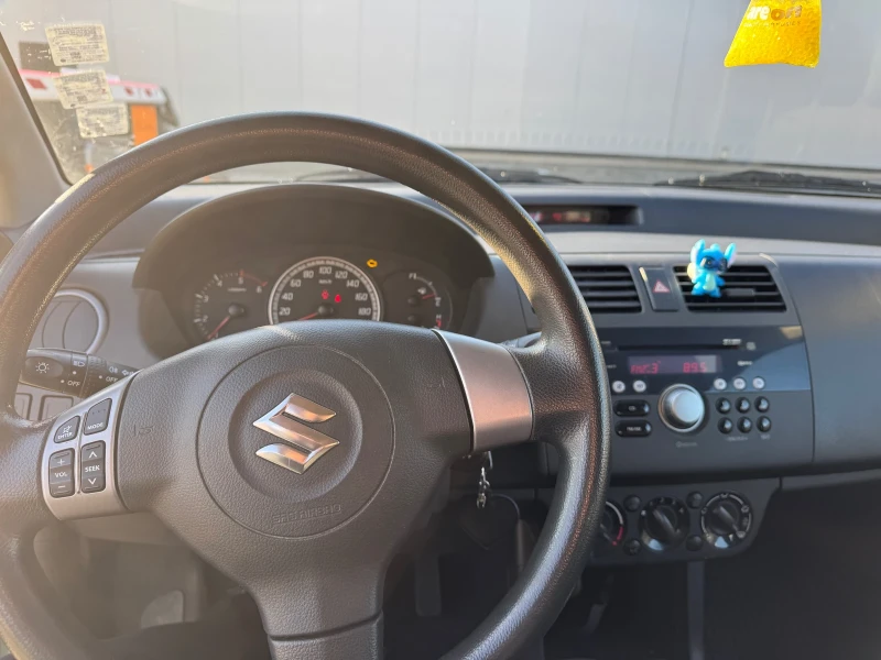 Suzuki Swift 1.3 , снимка 9 - Автомобили и джипове - 48411135