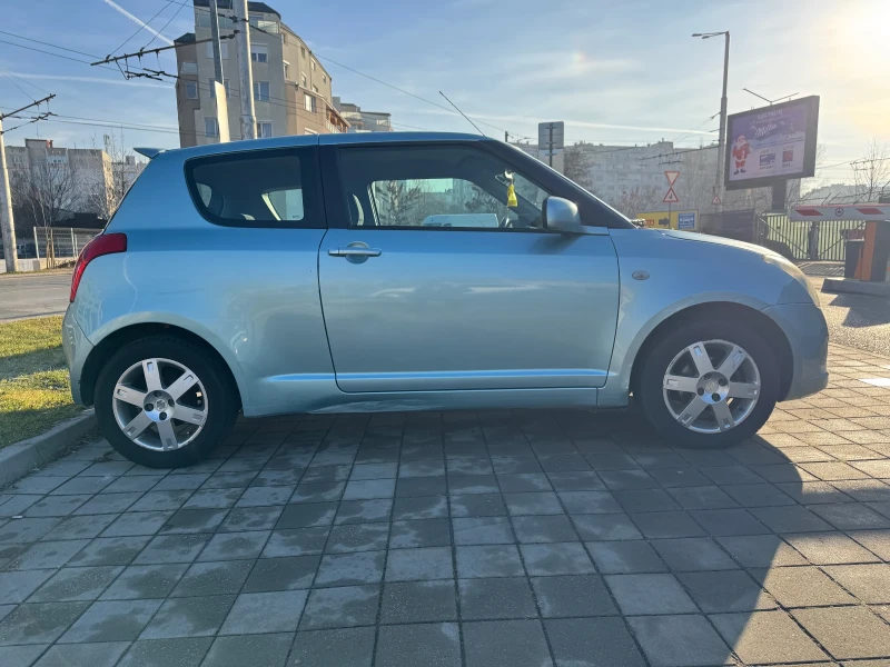 Suzuki Swift 1.3 , снимка 7 - Автомобили и джипове - 48411135