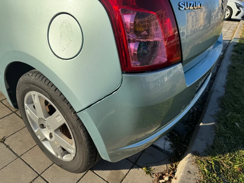 Suzuki Swift 1.3 , снимка 17 - Автомобили и джипове - 48411135