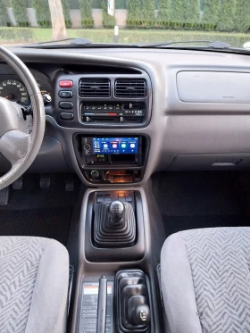 Suzuki Grand vitara 1.6i/4×4/Клима* 97157км!!!! Реални* Теглич* , снимка 15