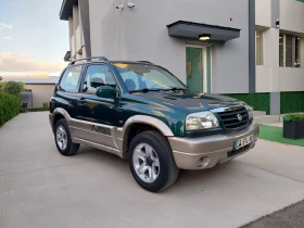 Suzuki Grand vitara 1.6i/4×4/Клима* 97157км!!!! Реални* Теглич* , снимка 2