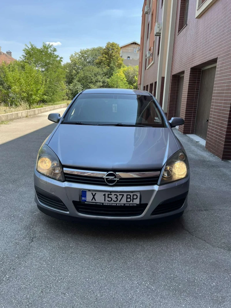 Opel Astra, снимка 15 - Автомобили и джипове - 52702260