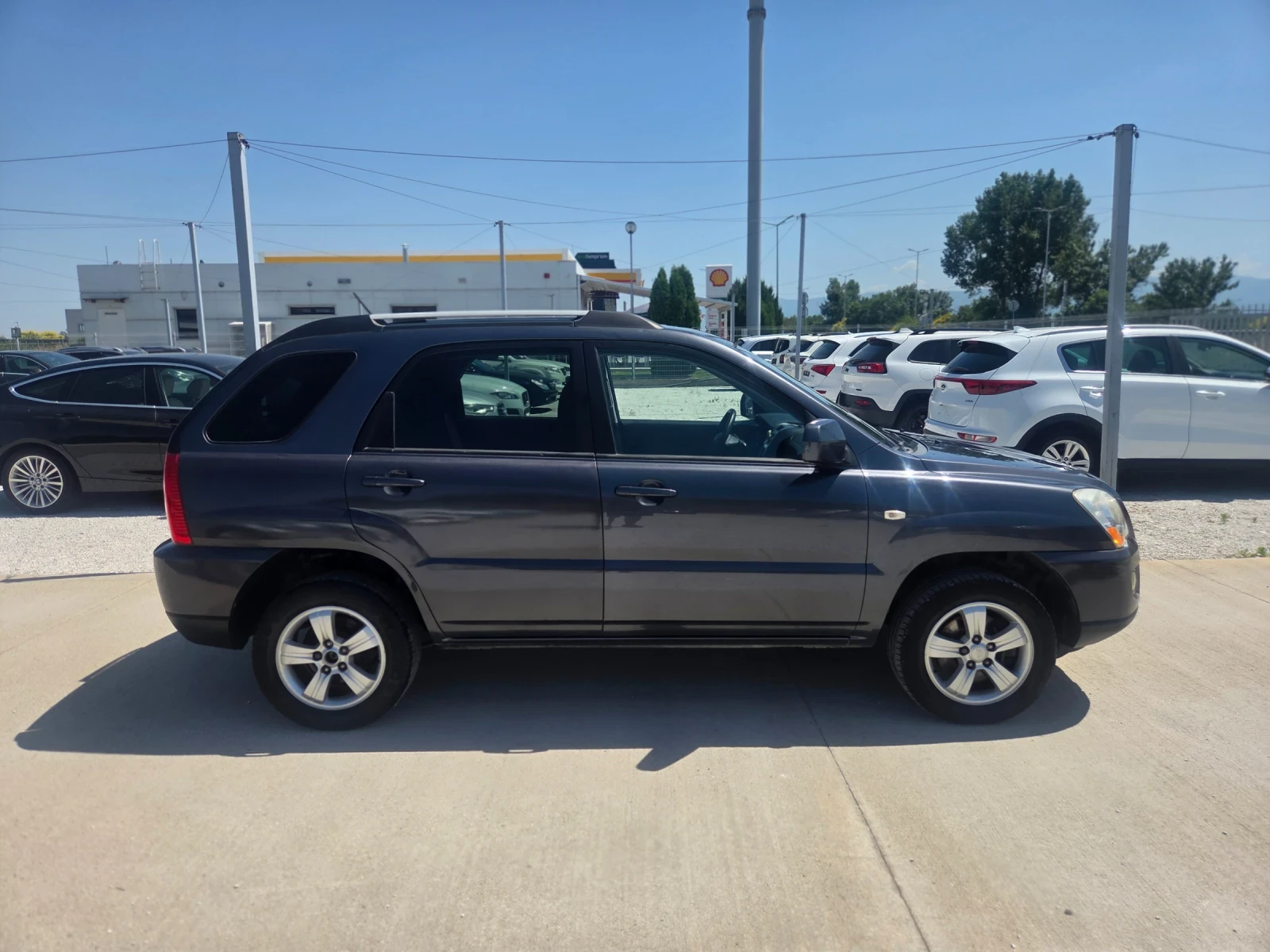Kia Sportage 2.0i ФАБРИЧНА ГАЗ/4-4, снимка 2 - Автомобили и джипове - 55104987
