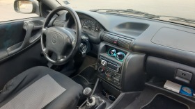Opel Astra 1.6 mi 75 КС., снимка 9