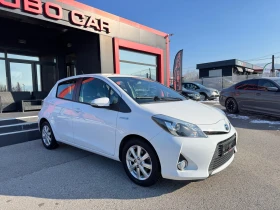 Toyota Yaris 1.5i-HYBRID-KEYLESS-NAVI-CAMERA-LED - 13500 лв. - 63937446 | Car24.bg