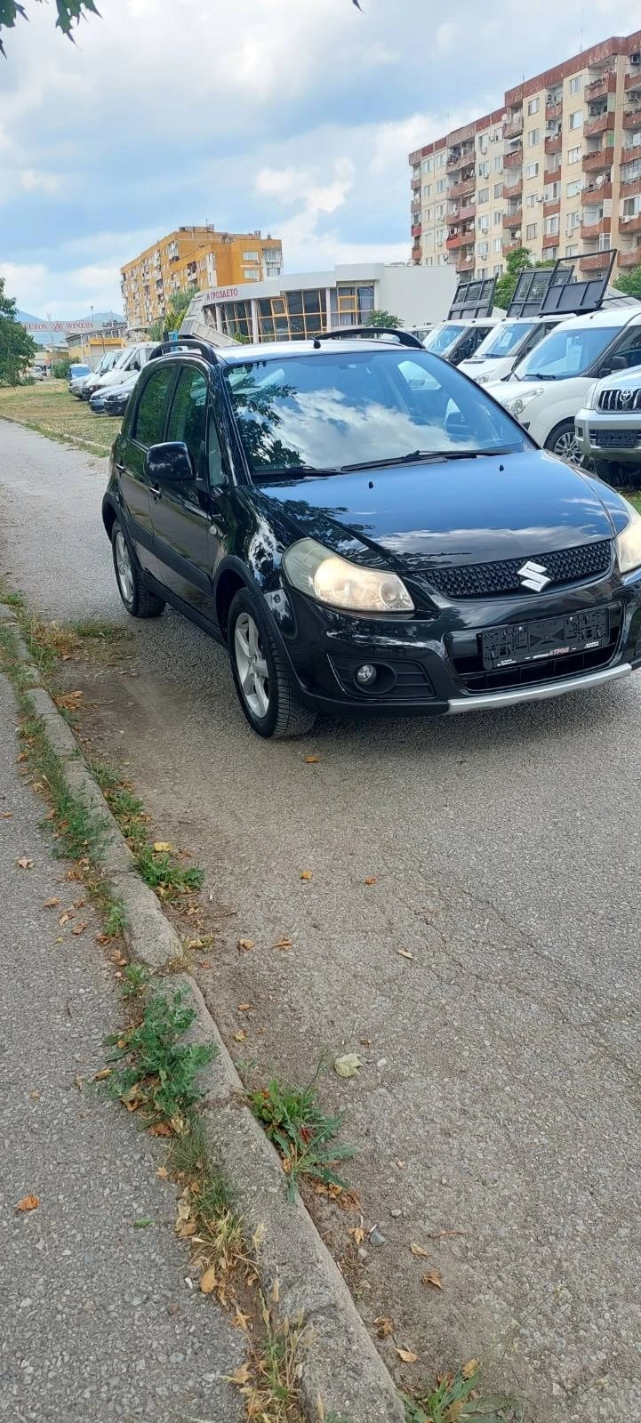 Suzuki SX4 1.6 бензин/газ клима, снимка 6 - Автомобили и джипове - 41385622