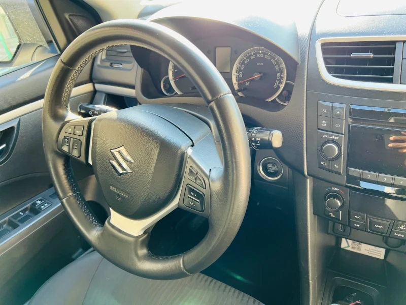 Suzuki Swift 1.2i нови гуми, снимка 4 - Автомобили и джипове - 52683123