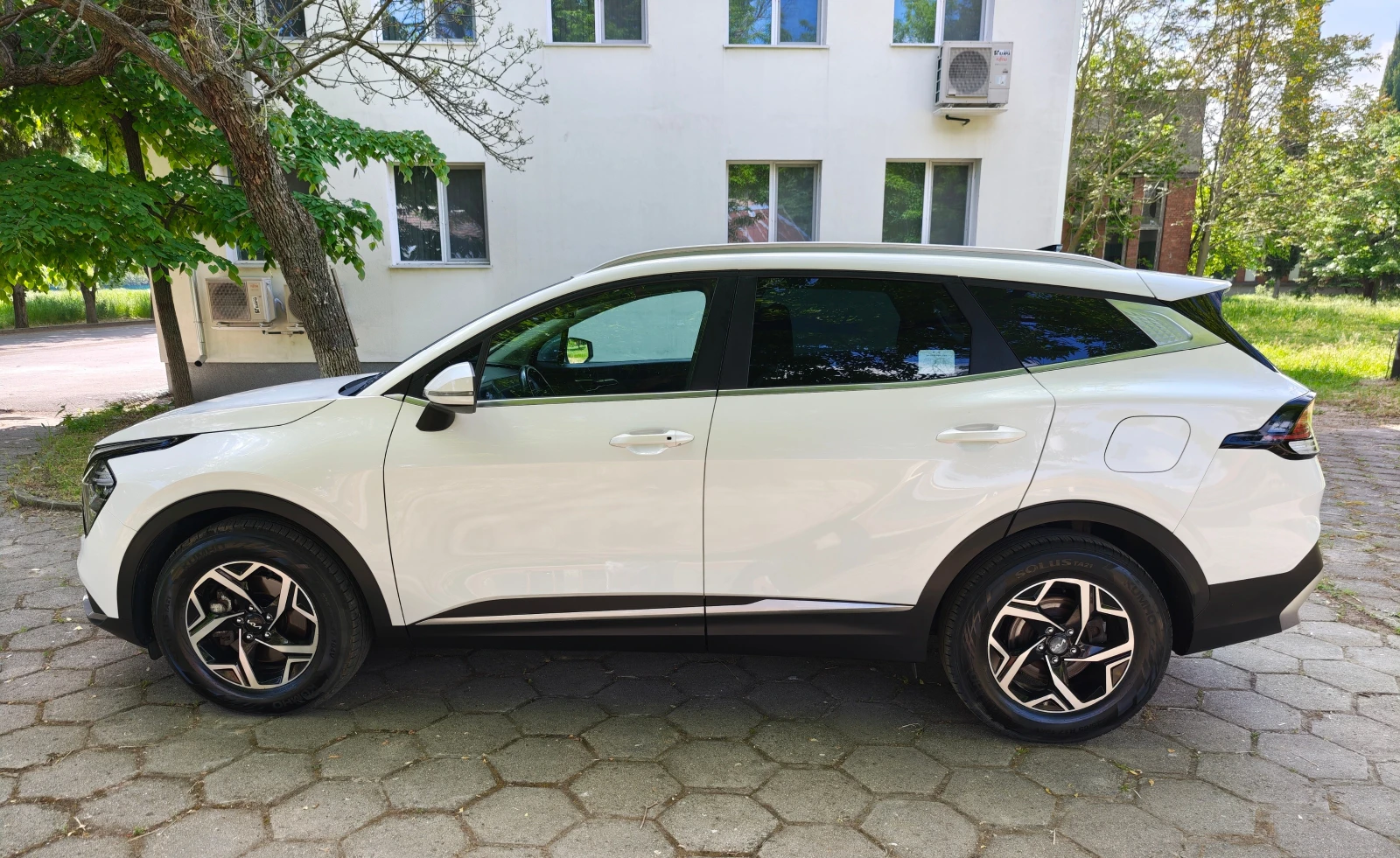 Kia Sportage 2.0 CRDI 4x4 , снимка 7 - Автомобили и джипове - 54043744