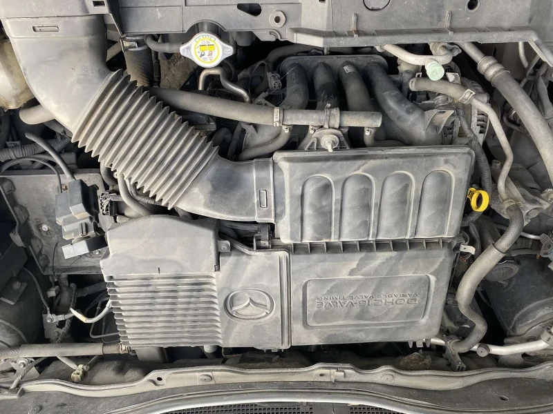 Mazda 2 1.3i, снимка 4 - Автомобили и джипове - 52956262