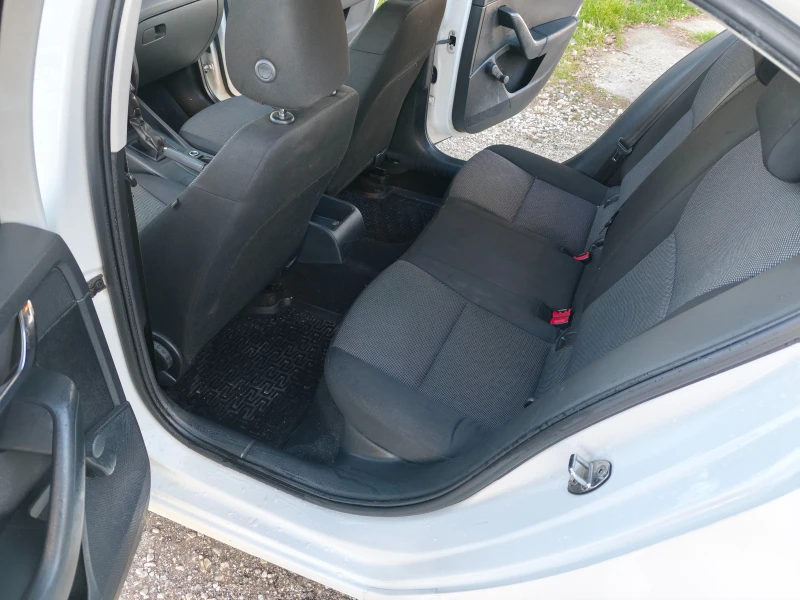 Skoda Octavia 1.6 TDI 90ks, снимка 13 - Автомобили и джипове - 53032678