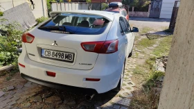 Обява за продажба на Mitsubishi Lancer 1.8 143 - LPG - BRC ~12 250 лв. - изображение 7 | Auto.bg Обява за продажба на Mitsubishi Lancer 1.8 143 - LPG - BRC ~12 250 лв. - изображение 7