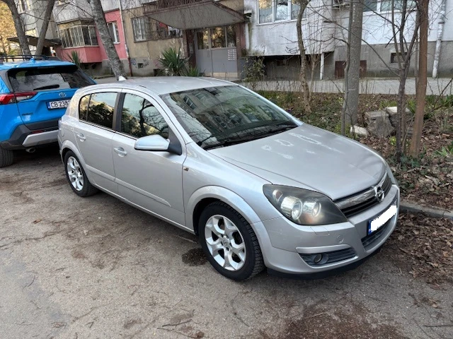 Opel Astra, снимка 7 - Автомобили и джипове - 53757659