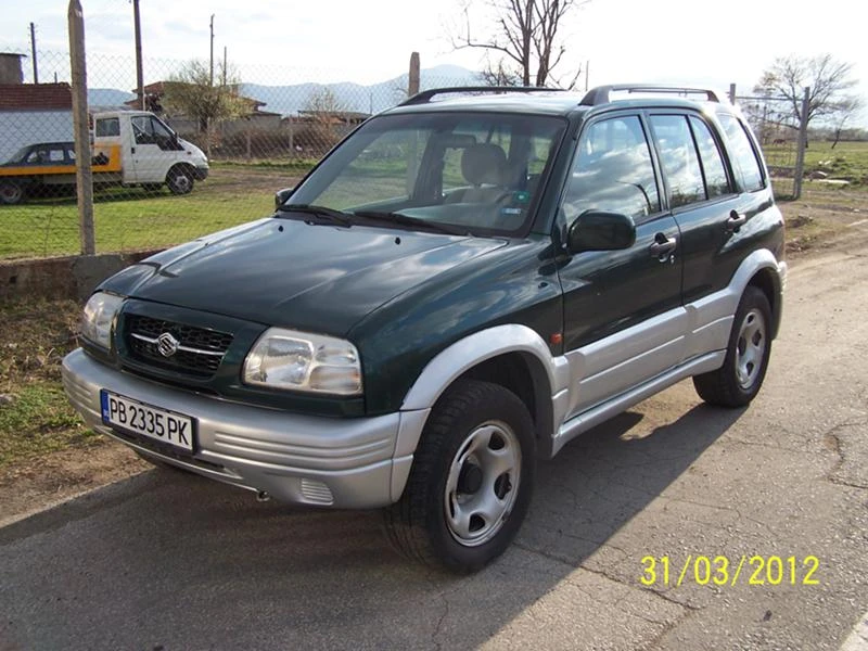 Suzuki Grand vitara, снимка 8 - Автомобили и джипове - 44063794