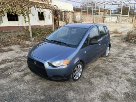 Mitsubishi Colt  - изображение 8