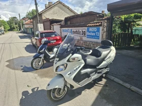 Suzuki Burgman 650ie ABS подгрев на ръкохватките и седалката, снимка 14
