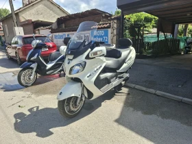 Suzuki Burgman 650ie ABS подгрев на ръкохватките и седалката