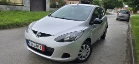 ������ Mazda 2