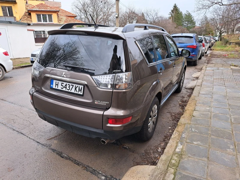 Mitsubishi Outlander Бензин-Газ 2.4 4х4 7 местен, снимка 11 - Автомобили и джипове - 53238616