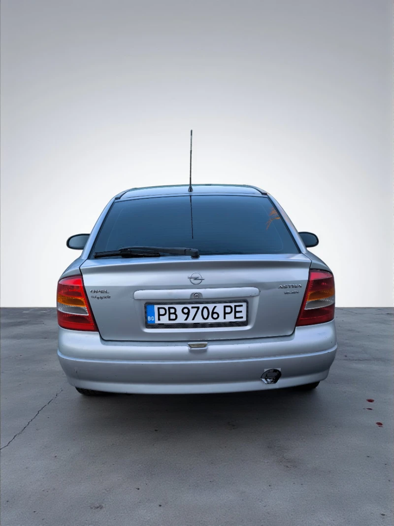 Opel Astra 1.6 benzin, снимка 7 - Автомобили и джипове - 53526092