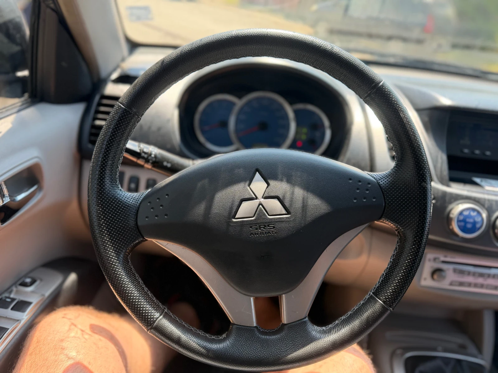Mitsubishi L200 136кс, снимка 12 - Автомобили и джипове - 54988688