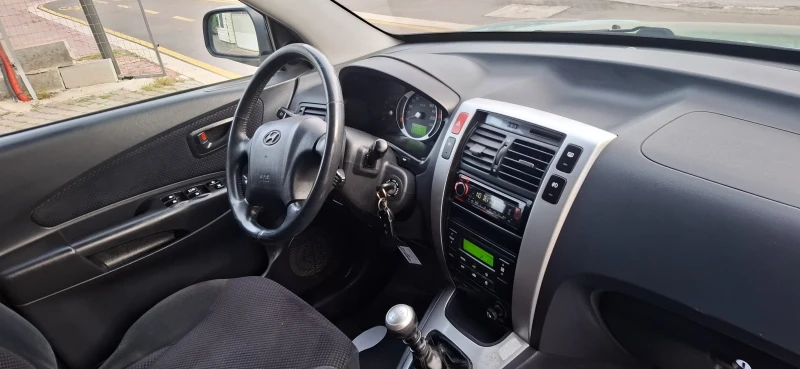 Hyundai Tucson 2.0crdi 141kc 4х4 6скорости  , снимка 9 - Автомобили и джипове - 50356342