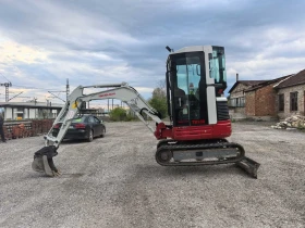 Багер Takeuchi TB23R