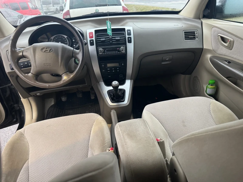 Hyundai Tucson 2.0 gas/benz 4x4, снимка 11 - Автомобили и джипове - 53436415