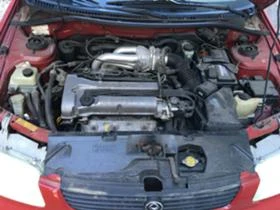 Mazda 323 1.5/16V , снимка 11