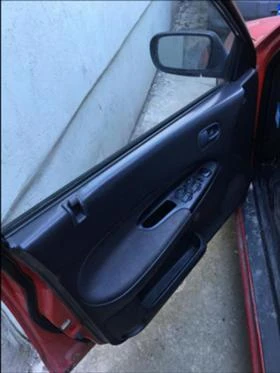 Mazda 323 1.5/16V , снимка 7