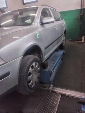 Skoda Octavia 1.9tdi/1.6б, снимка 13