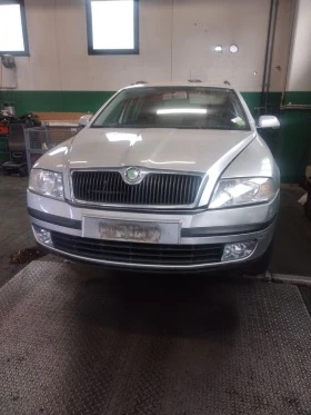 Skoda Octavia 1.9tdi/1.6б, снимка 2