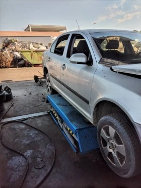 Skoda Octavia 1.9tdi/1.6б, снимка 9