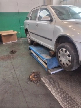 Skoda Octavia 1.9tdi/1.6б, снимка 14