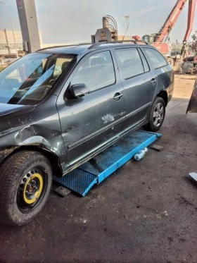 Skoda Octavia 1.9tdi/1.6б, снимка 6