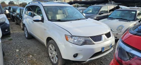 Mitsubishi Outlander 2.2 DI-D Instyle 7 места  - 5990 € / 11715.42 лв. - 62884251 2