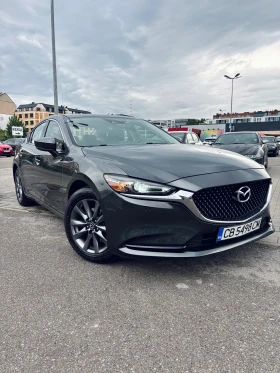 ������ Mazda 6