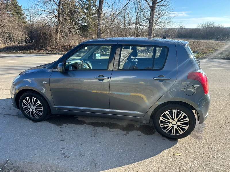 Suzuki Swift 1.3i, снимка 7 - Автомобили и джипове - 48063878