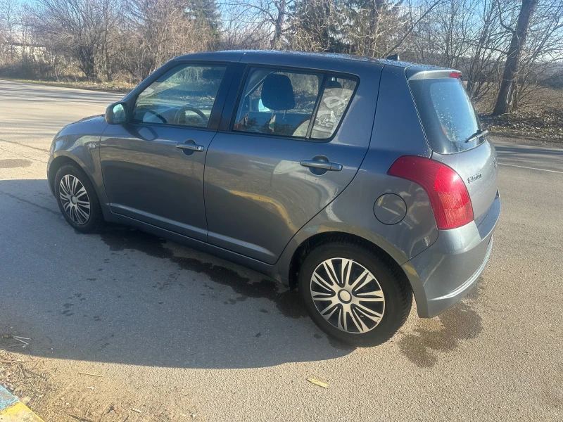 Suzuki Swift 1.3i, снимка 8 - Автомобили и джипове - 48063878