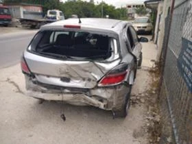 Opel Astra 1.4 i/1.7 CDTI , снимка 6