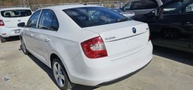 Skoda Rapid 1.6tdi 116кс*Нави*ПОДХОДЯЩА ЗА ТАКСИ, снимка 2