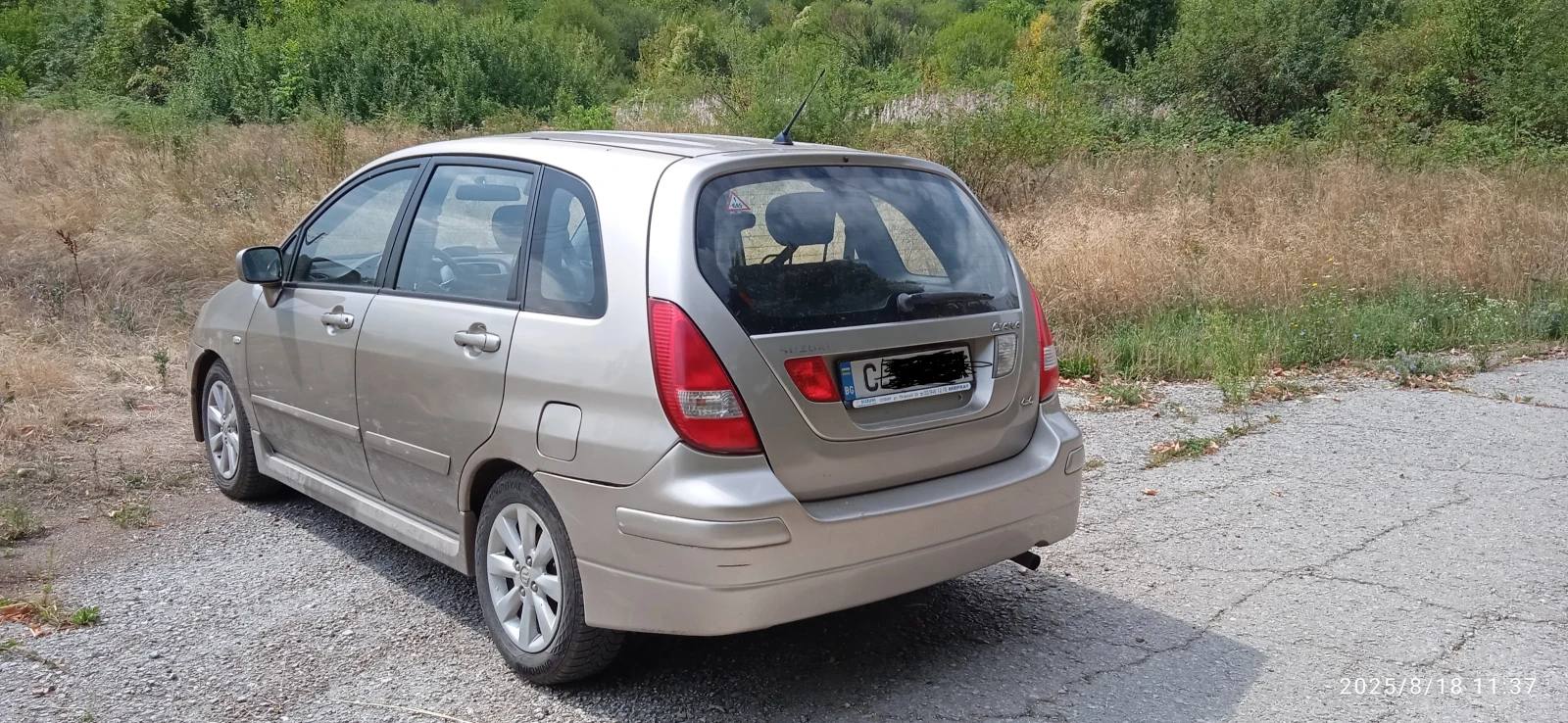 Suzuki Liana Аерио - изображение 8