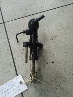 Помпа съединител горна Киа Каренс 2.0crdi