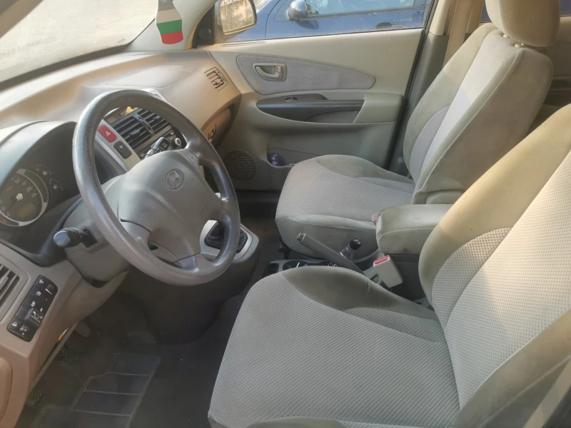 Hyundai Tucson, снимка 11 - Автомобили и джипове - 47707618